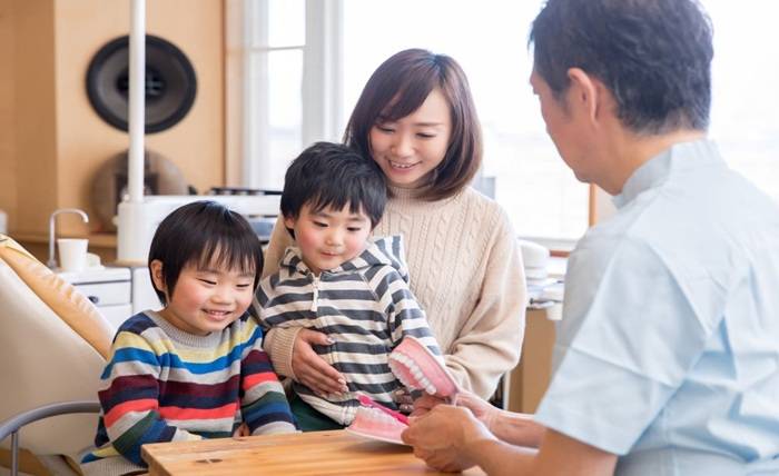 Your Family’s Oral Health Hub: The Benefits of One Dentist for All
